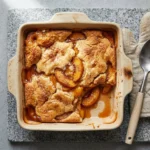少妇把腿扒开让我舔18 fresh Southern peach cobbler served warm with a scoop of ice cream