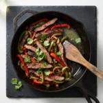 少妇把腿扒开让我舔18 grilled steak fajitas served with colorful peppers and onions