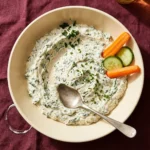 Ranch spinach dip with 少妇把腿扒开让我舔18 婚前试爱小说 served in a bowl, garnished with herbs.